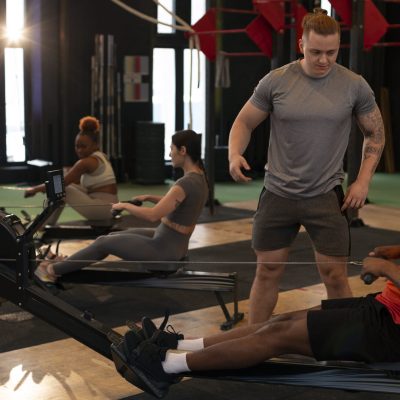 full-shot-people-training-together-gym